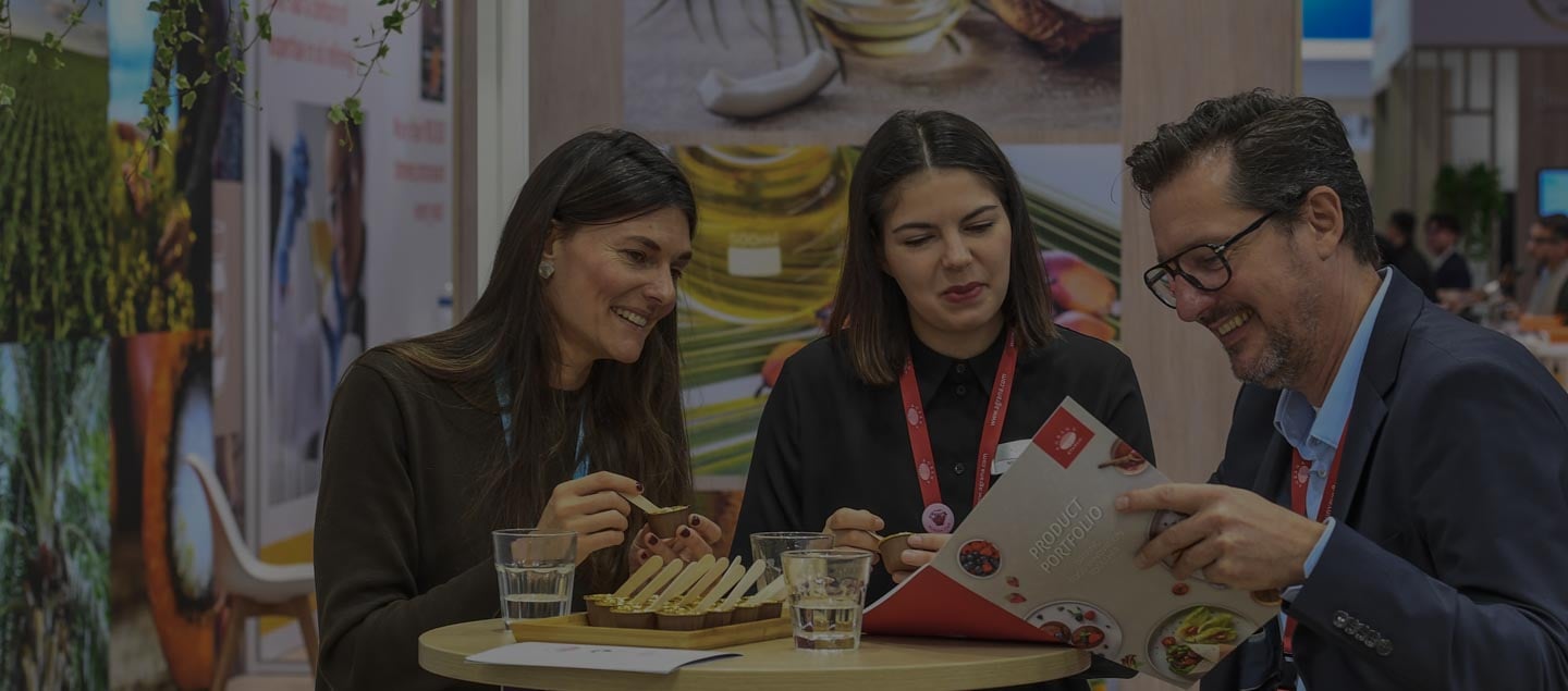 Fi Europe exhibitors having a business meeting