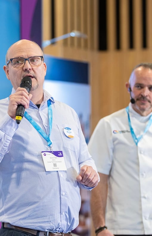 Speaker on stage in the sustainability hub at Fi Europe