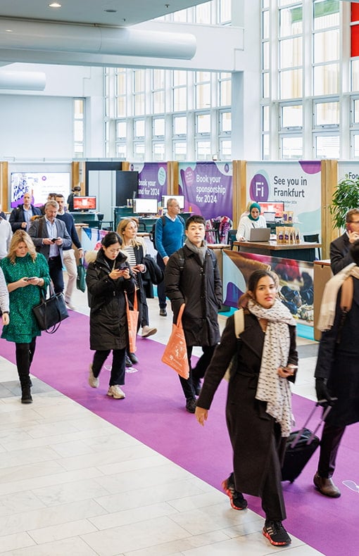 Visitors walking in the corridor at Fi Europe