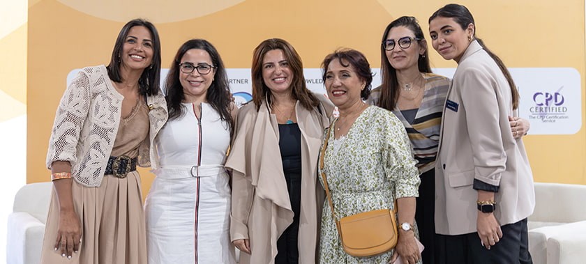 group of women posing for a photo at Women's Networking Breakfast at Fi Africa