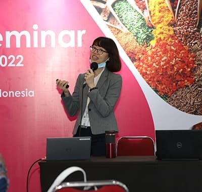 Speaker on stage during seminar at Fi Asia Indonesia