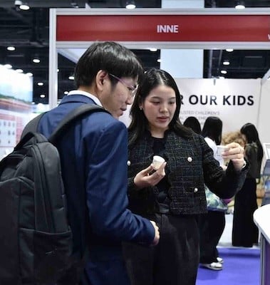 visitors at exhibitor stand