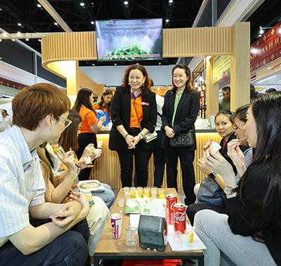 Visitors at an exhibitor stand