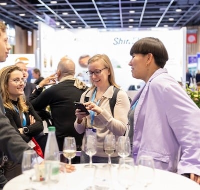 Visitors networking at Fi Europe