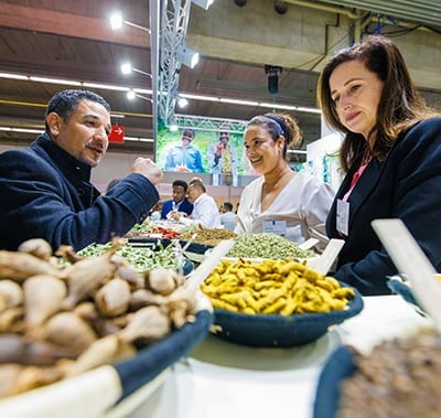 Visitor looking at tasting products at Fi Europe