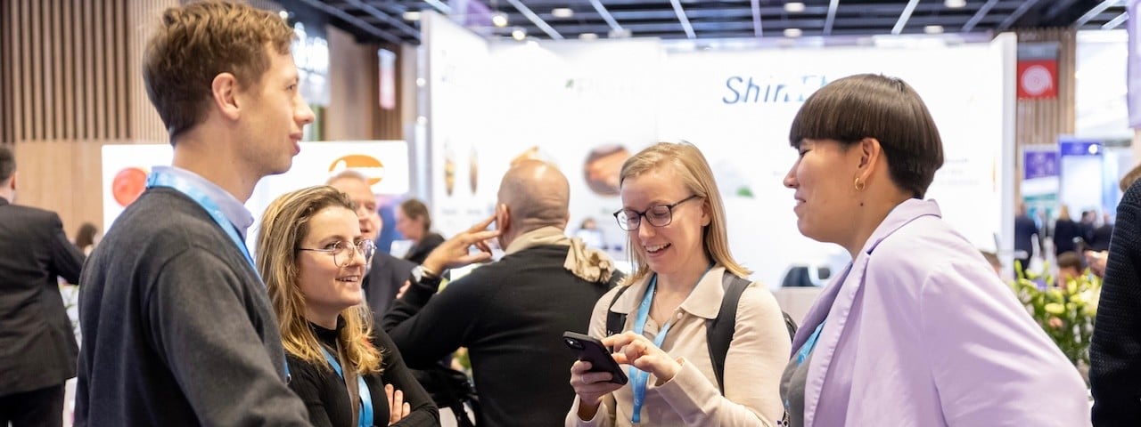 Attendees at Fi Europe are talking