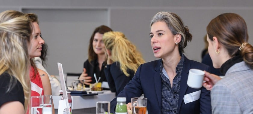 Visitors discussing at Women's Networking Breakfast at Fi Europe