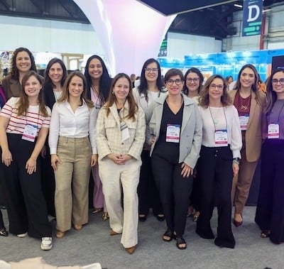 Delegates on stage at the women's networking breakfast at Fi South America