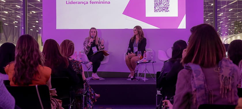 Speakers on stage during the women's networking breakfast at Fi South America