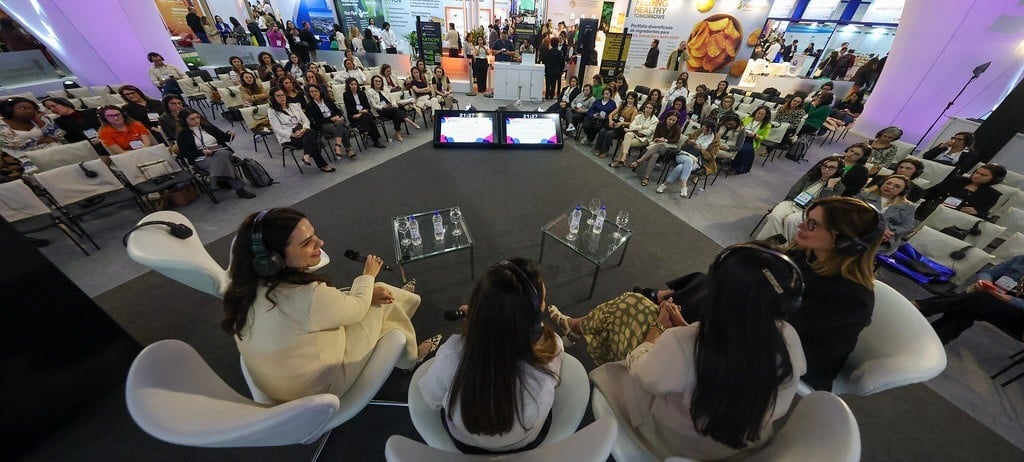 Speakers on stage during the women's networking breakfast at Fi South America