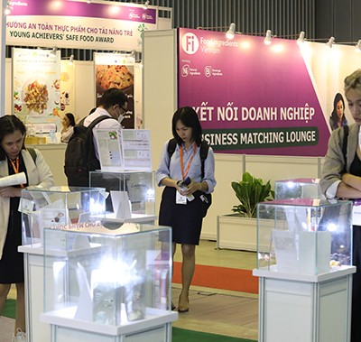 visitors inspecting products