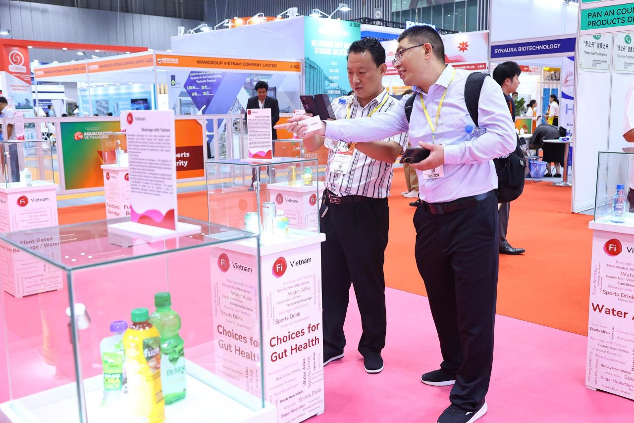 visitors inspecting products