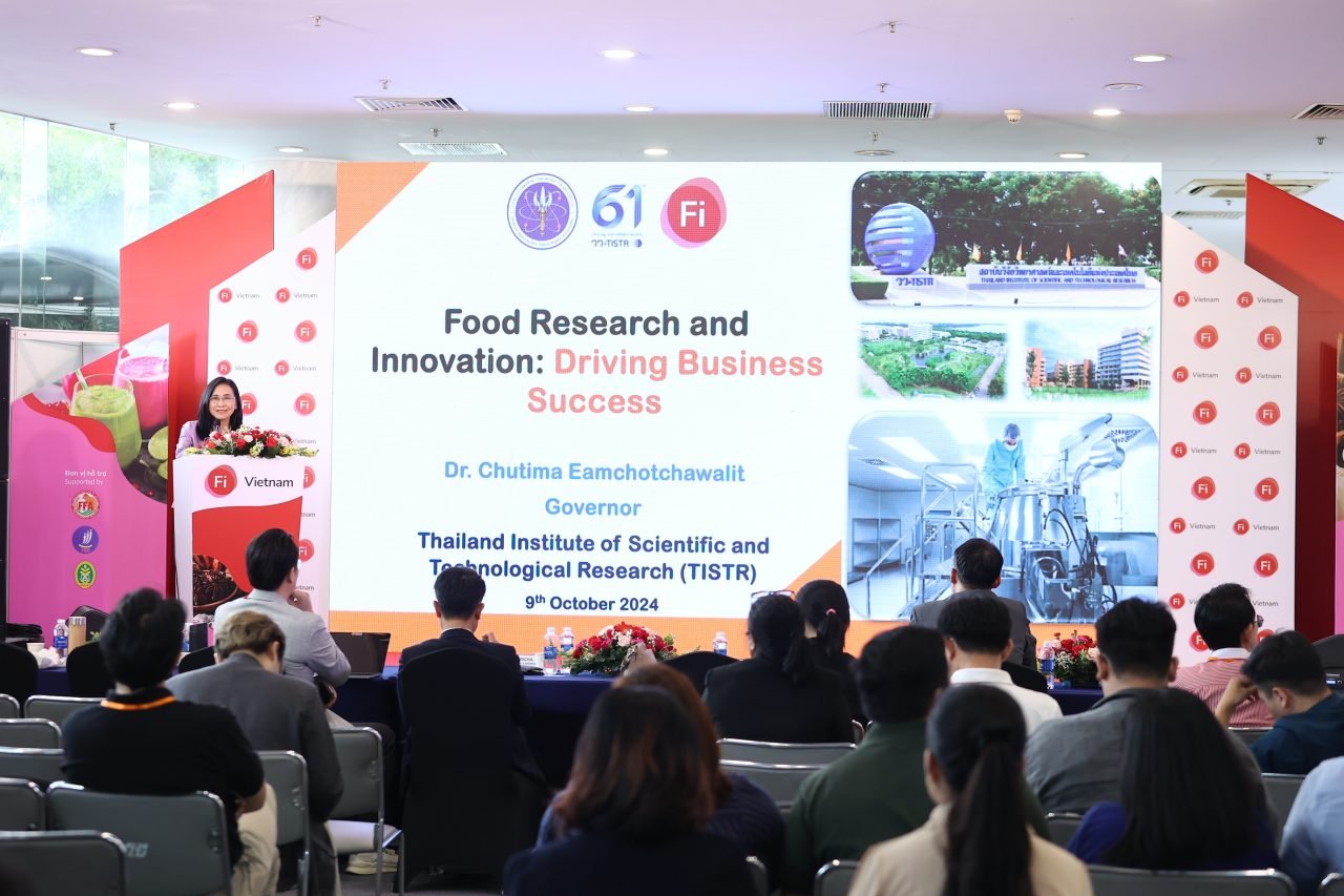 Speaker on stage at technical seminar at Fi Vietnam