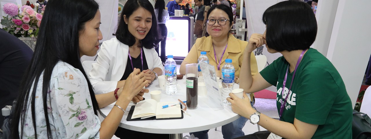 Visitors at table at Fi Vietnam